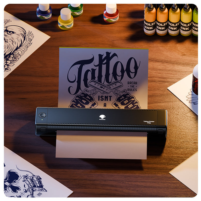 TP81 tattoo printer printing stencil with text design surrounded by tattoo inks on wooden table